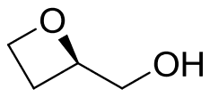Oxetan-2-ylmethanol, an oxetane with a CH2OH group and the ring C-O bond drawn wedged